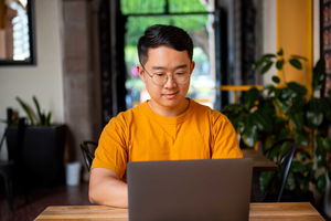 man using laptop