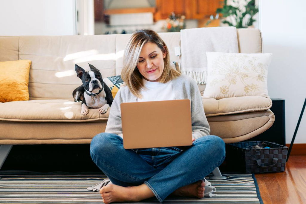 person using laptop at home