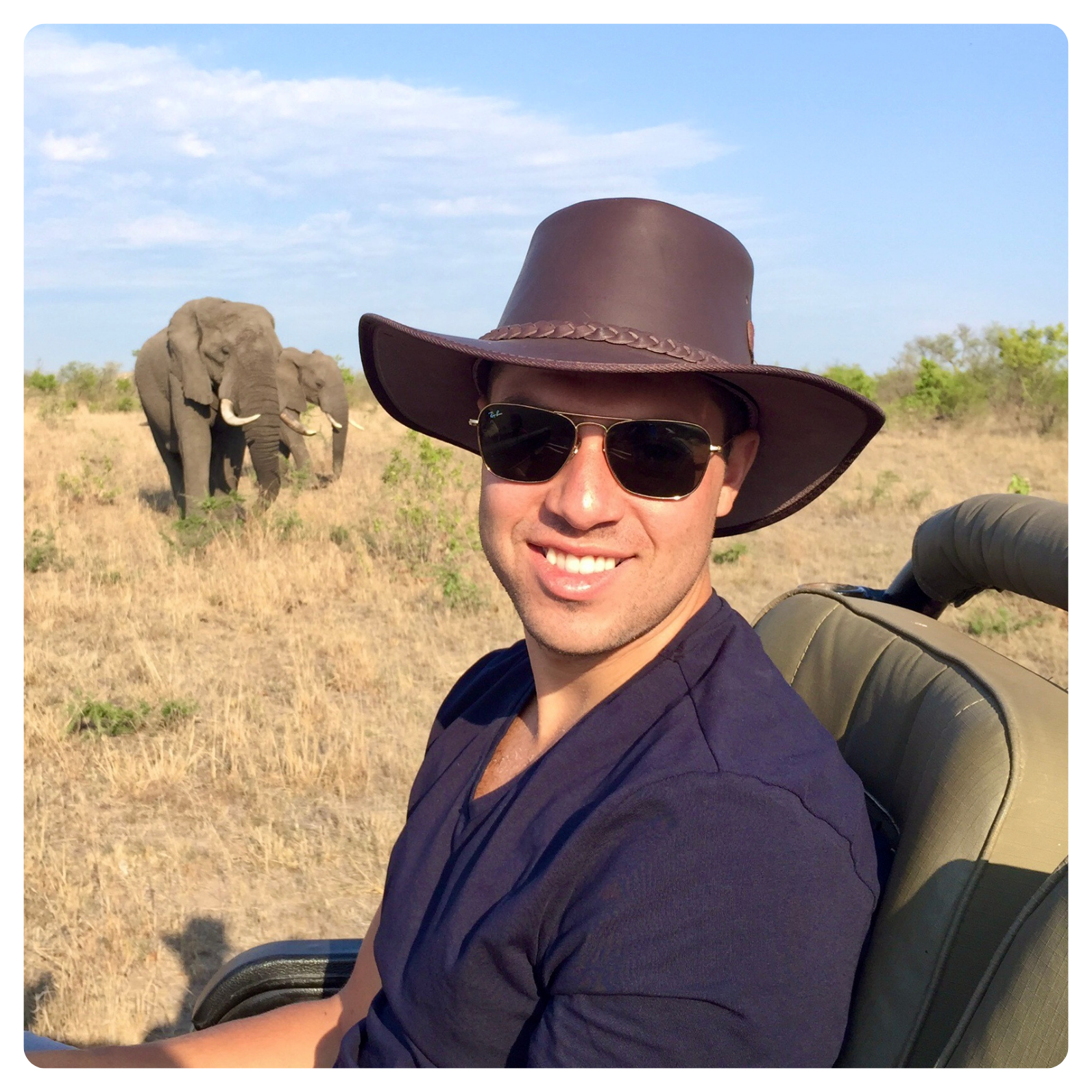 concierge web photos (21) David on safari with elephants in the background