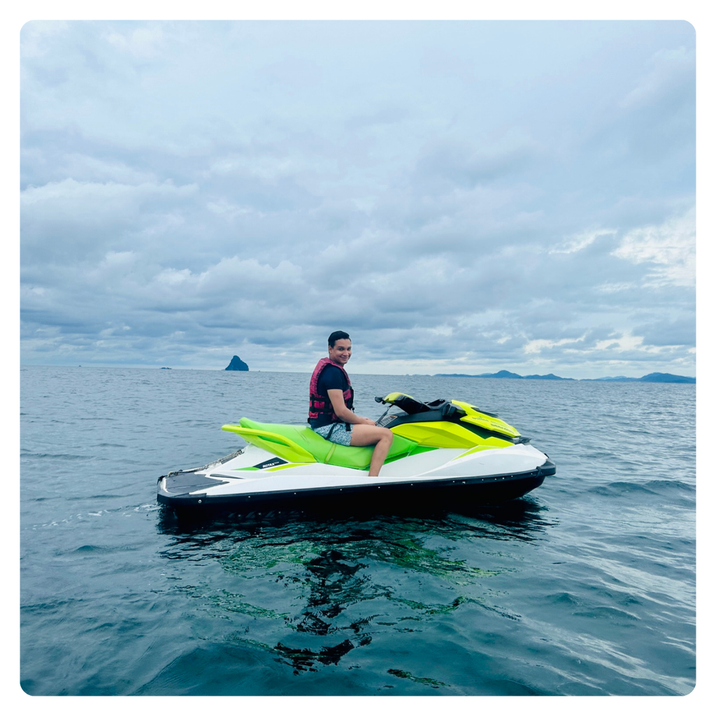 Carlos on a jet-ski in the ocean