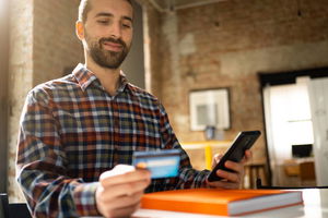 business owner using credit card