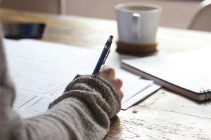 person writing list